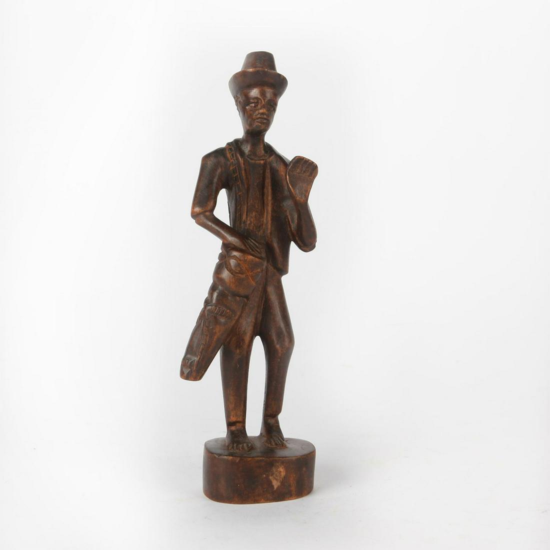 HAND CARVED WOODEN FIGURE, MAN WITH HAT PLAYING DRUM (1 of 3)
