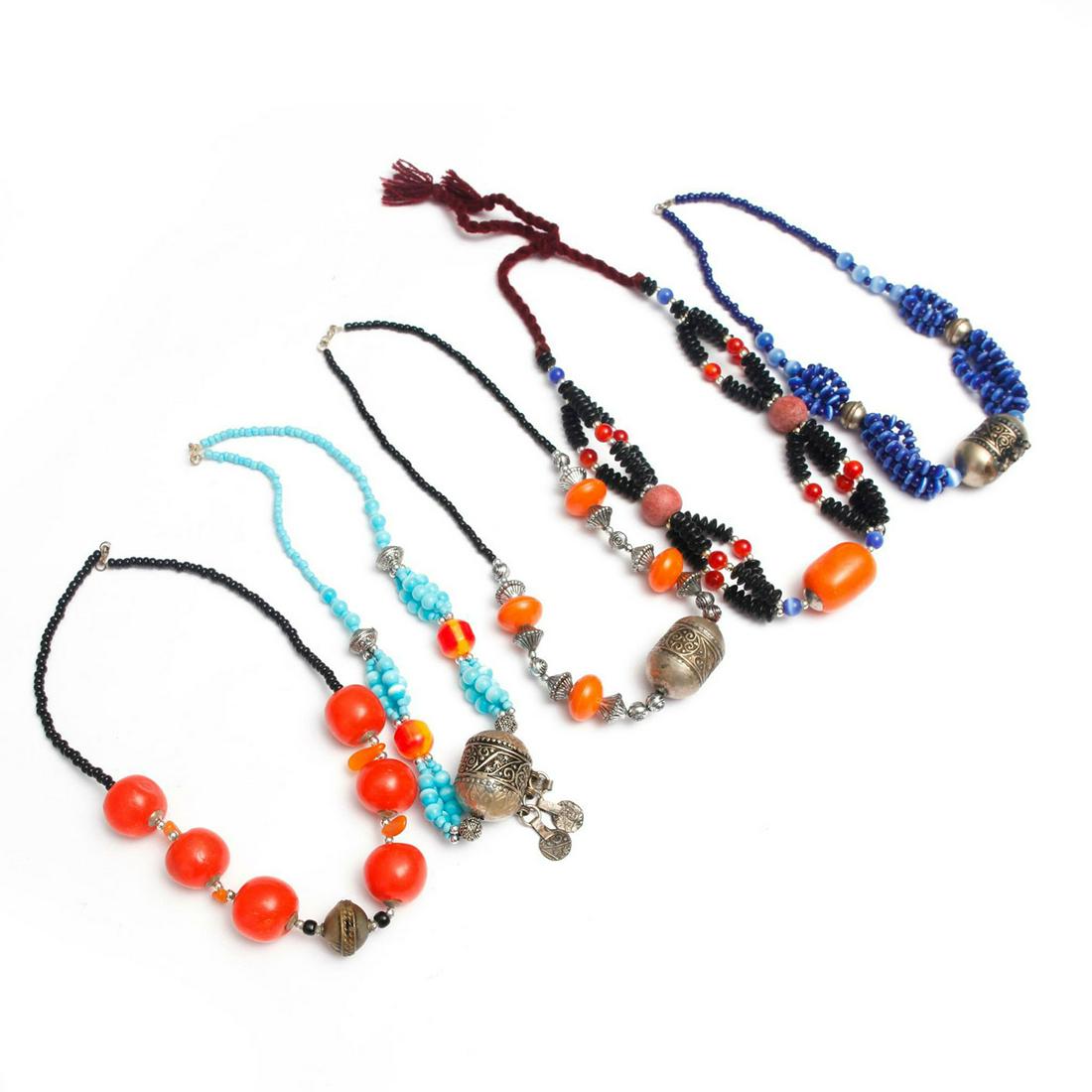 5 BEDOUIN BEADED NECKLACES: Beads of resin, glass, stone, and mixed metals. Issued: Late 20th - Early 21st c. Dimensions: 20" x4, 22"C