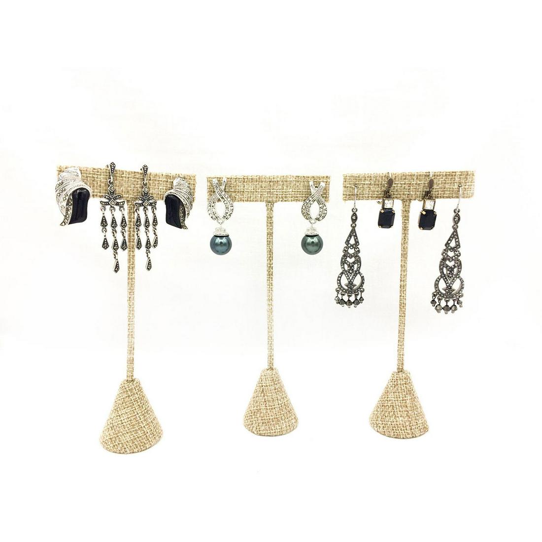 SIX PAIRS OF SILVER MARCASITE EARRINGS: Dazzling set of marcasite earrings. One pair is bronze. One pair is stamped. The lengths are 1"L, 1.25"L, 1.5"L, 2"L and 2.5"L. The total weight is 38.3g. Issued: 20th c. Provenance: David Farin Colle