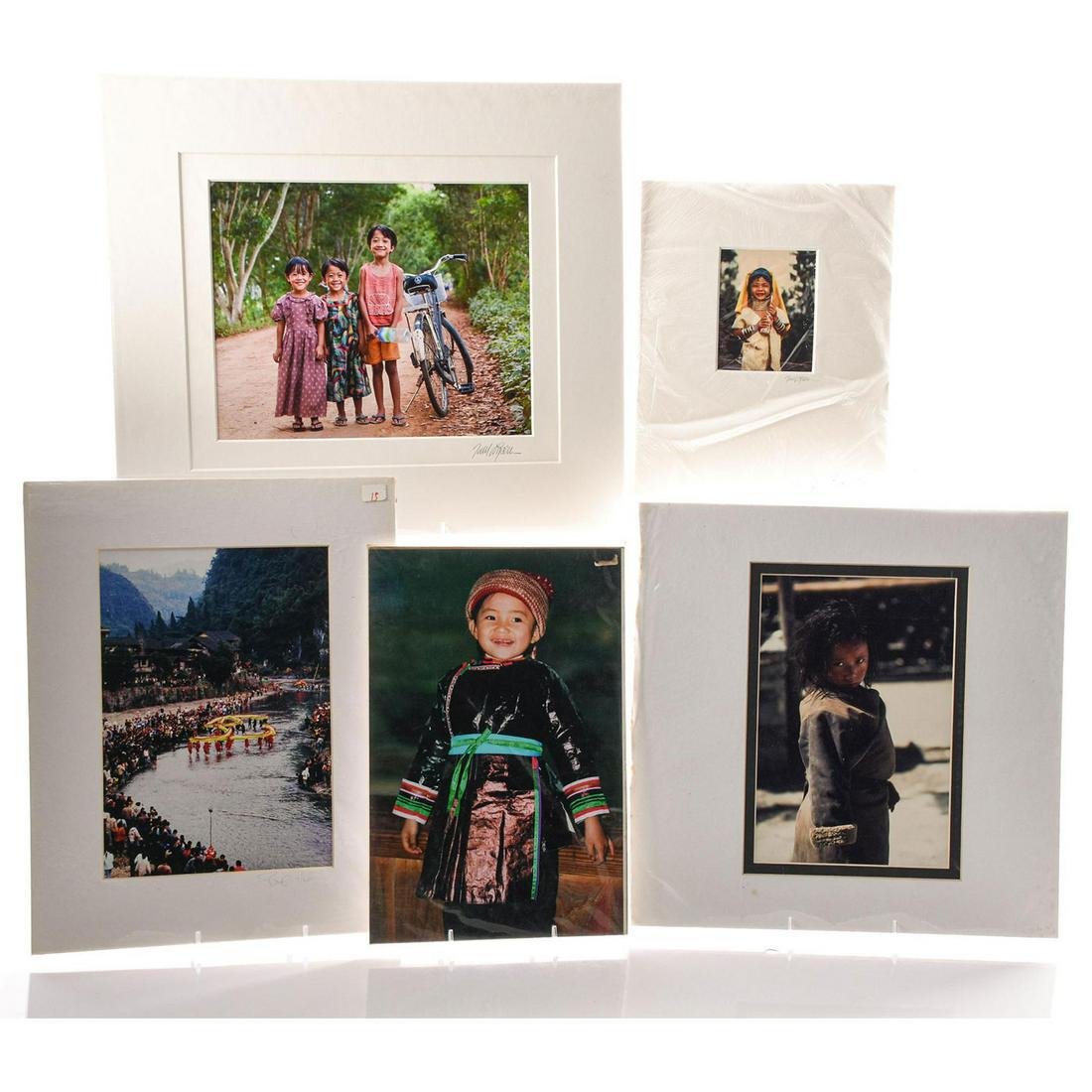 FIVE PHOTOGRAPHS, SCENES IN ASIA, TODD LUNDEEN AND: Five photos of children in Thailand, Burma and Tibet. Two of the photos are by Todd Lundeen: Sisters - Burma 14"L x 16"W and Padaung Girls - Northern Thailand. Issued: 20th c. Dimensions: 14"L x 16"W 