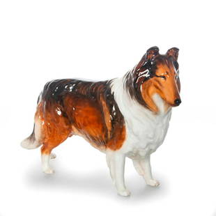 ROYAL DOULTON COLLIE DOG FIGURINE, HN1057: The right ear has been restored. Issued: 20th c. Dimensions: 7.5"H Manufacturer: Royal Doulton Country of Origin: England