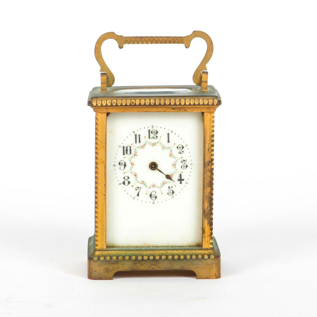 SMALL WRITING DECK BRASS CLOCK WITH WINDUP KEY. (1 of 6)