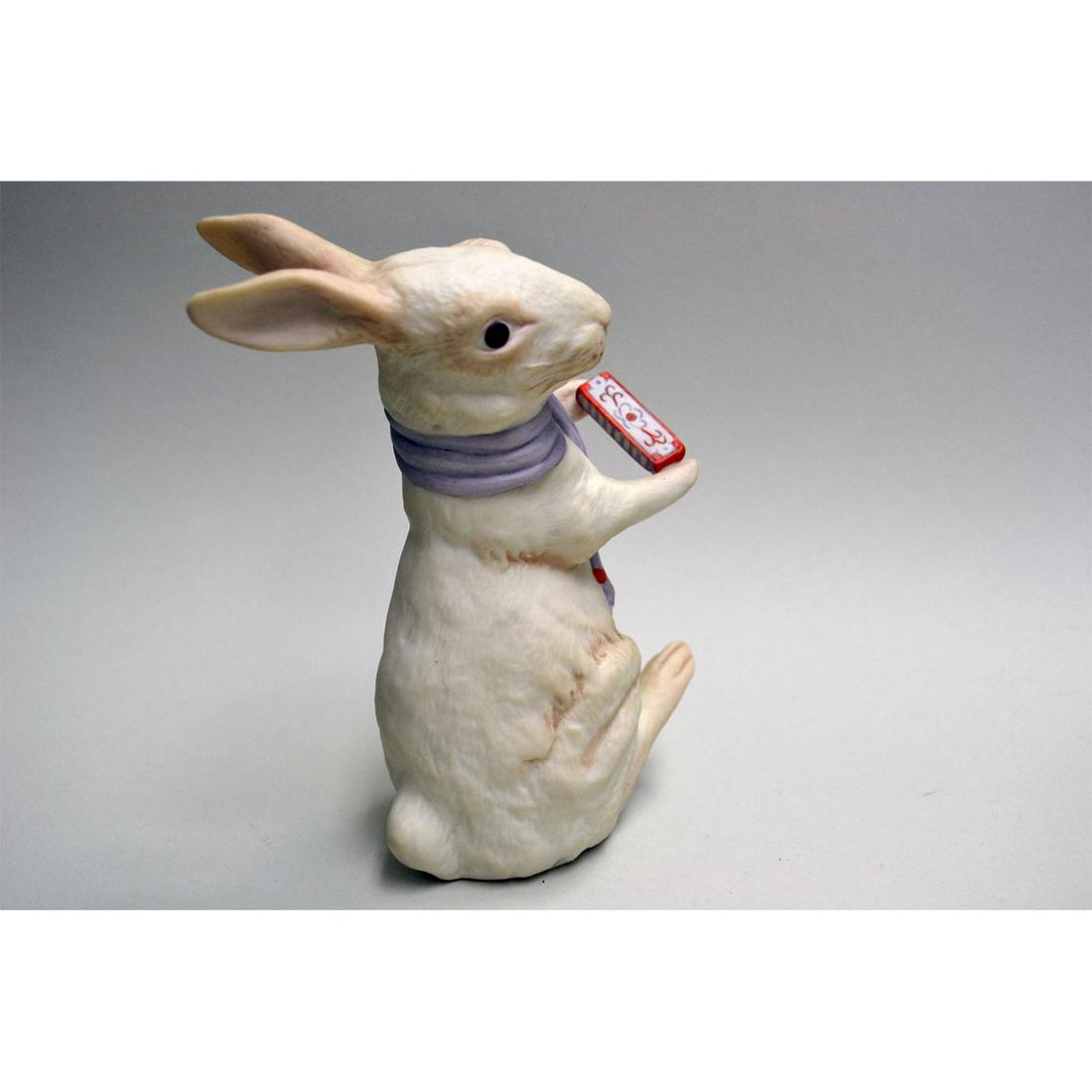 CYBIS PORCELAIN RABBIT WITH HARMONICA: Bisque Porcelain Decorated. Hand created, hand painted by the artisans of the Cybis Studios. Closed Edition. USA. Hallmark: Signed Cybis. Artist: Cybis Issued: 1990 Dimensions: 6 1/2"H x 2 1/2"W x 3 1