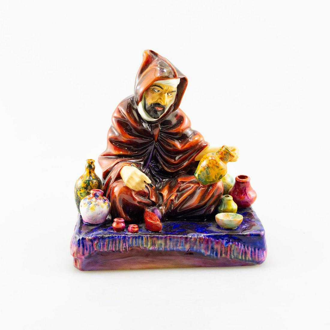 THE POTTER HN1493 - ROYAL DOULTON FIGURINE: Part of the Middle Eastern Heritage series. Royal Doulton backstamp. Artist: Charles J. Noke Issued: 1932 - 1992 Dimensions: 7"H Manufacturer: Royal Doulton