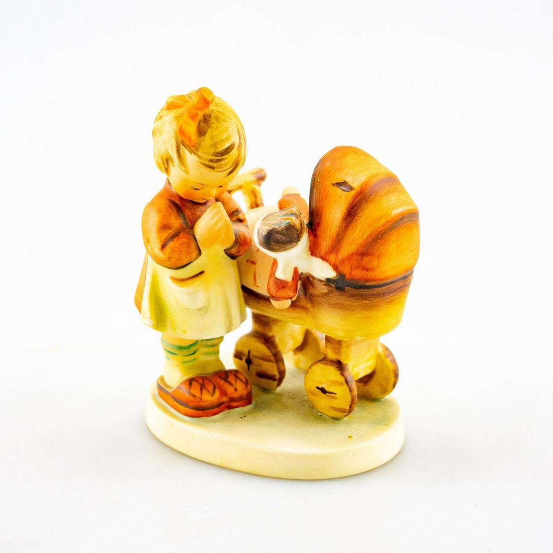 GOEBEL HUMMEL FIGURINE, DOLL MOTHER 67: Girl praying for baby doll. Goebel backstamp. Issued: 20th C. Dimensions: 4" tall Manufacturer: Goebel Country of Origin: Germany