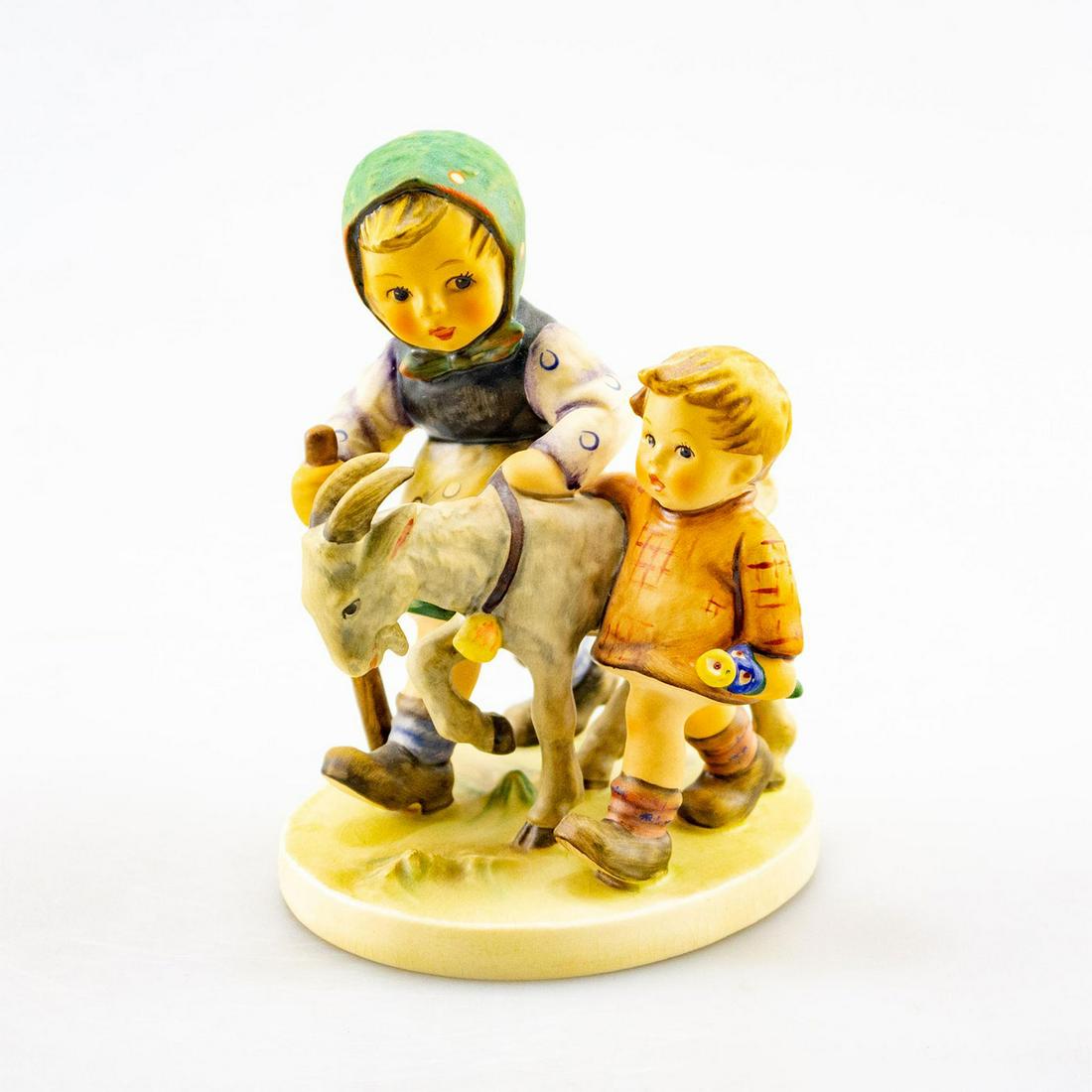 GOEBEL HUMMEL FIGURINE, HOMEWARD BOUND 334: Children bringing home their goat. Goebel backstamp. Issued: 20th C. Dimensions: 5.5" tall Manufacturer: Goebel Country of Origin: Germany