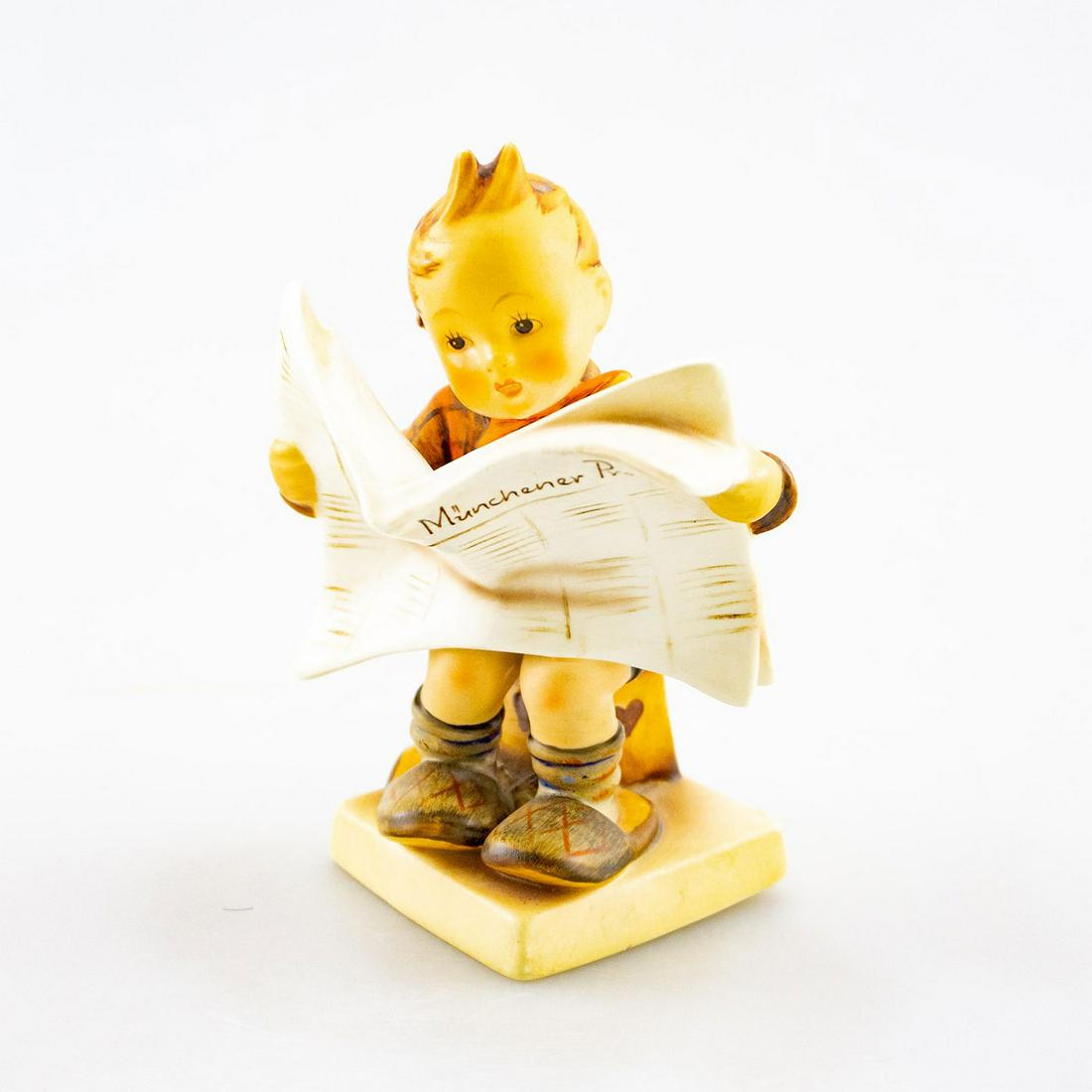 GOEBEL HUMMEL FIGURINE, LATEST NEWS 184: Learning how to read. Goebel backstamp. Issued: 20th C. Dimensions: 5" tall Manufacturer: Goebel Country of Origin: Germany