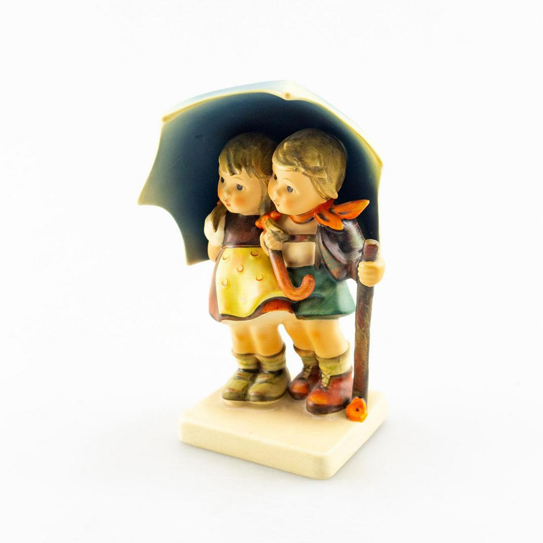 GOEBEL HUMMEL FIGURINE, STORMY WEATHER 71: Master Collection. Handcrafted; hand painted. Goebel backstamp. Issued: 20th c. Dimensions: 6"H Manufacturer: Goebel Country of Origin: Germany