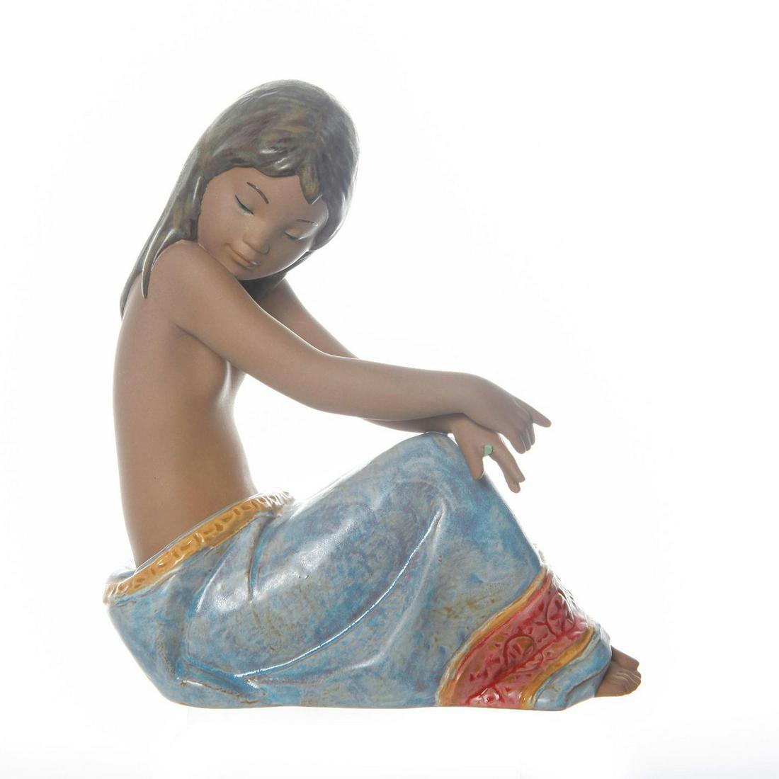 LLADRO FIGURINE, 2382 ISLAND BEAUTY: Lladro backstamp. Missing flower from hand. Issued: 20th C. Dimensions: 7.5" Tall Manufacturer: Lladro Country of Origin: Spain