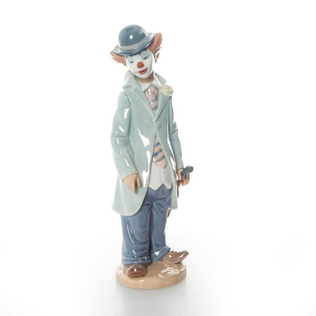 LLADRO FIGURINE, 5472 CIRCUS SAM WITH ORIGINAL BOX: Lladro backstamp. Issued: 20th C. Dimensions: 9" Tall Manufacturer: Lladro Country of Origin: Spain