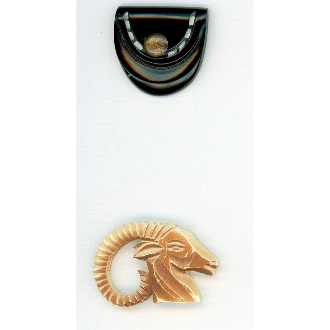 TWO REALISTIC SHAPED CASEIN BUTTONS: Two Large realistic Casein examples with paint DF. Included in this lot is a nice realistic purse button with a brass button closure and white paint decorative finish. The other is a realistic pierced