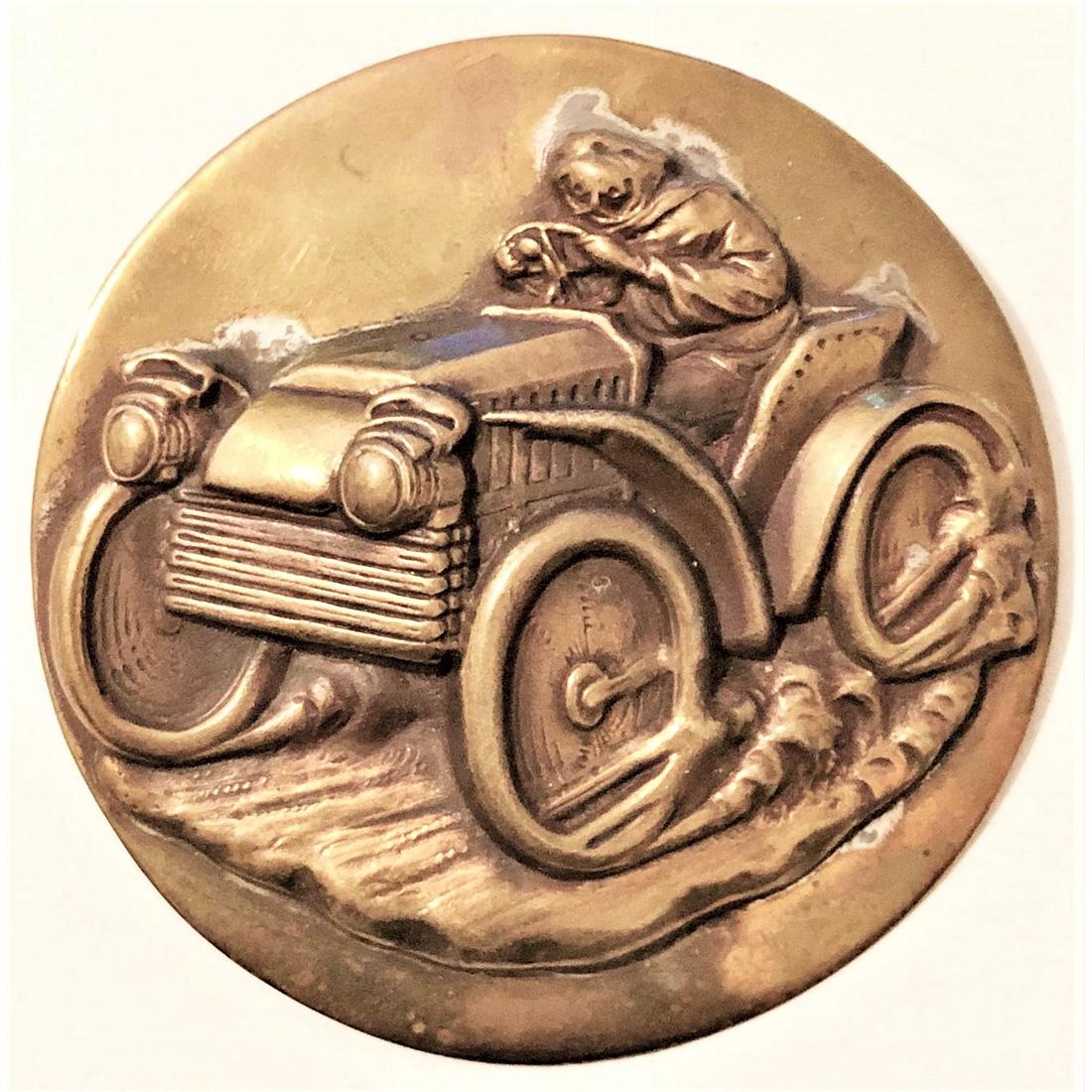 ONE BRASS BUTTON DEPICTING "BARNEY OLDFIELD": 1 extra large well made and detailed brass car and rider button. This button has often been called "Barney Oldfield" but it has also been said it is not. Whatever it is called itï¿½s a really cool