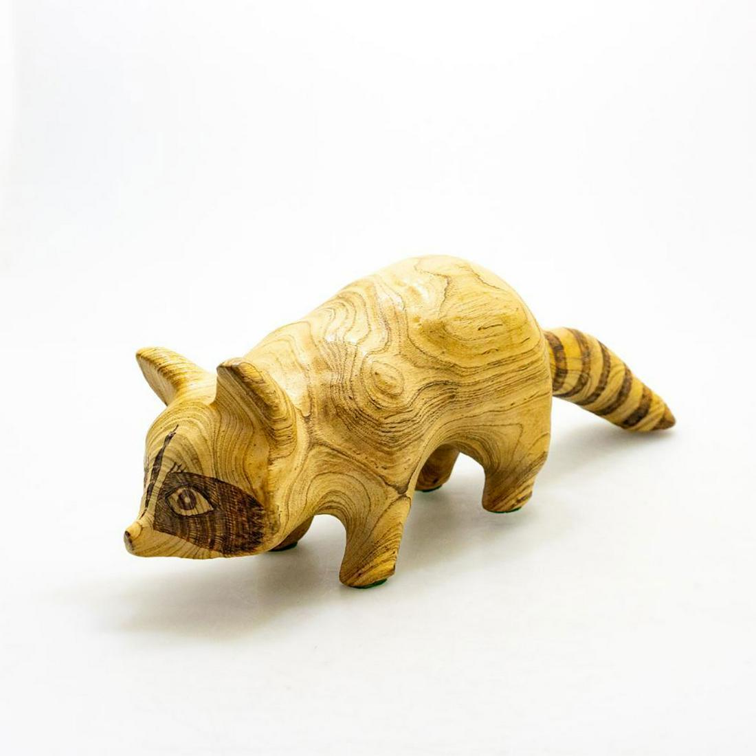 C.M. COPELAND LARGE CARVED WOODEN RACCOON FIGURE (1 of 3)