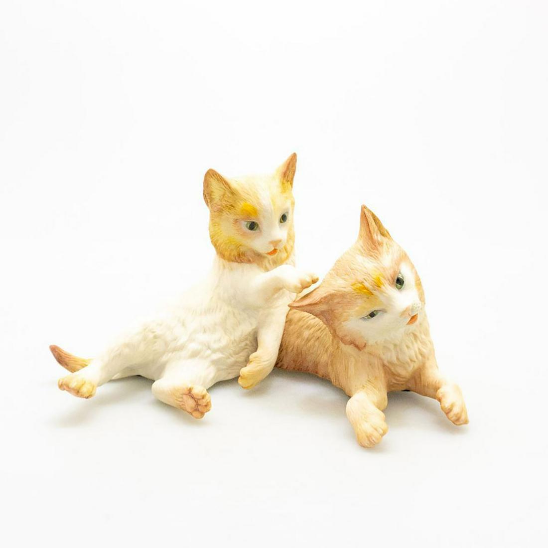 CYBIS PORCELAIN FIGURAL, CATS, RUFFLES & TRUFFLES: One cat playfully nudges another on the ear. Issued: 20th c. Dimensions: 5.75"H Manufacturer: Cybis Country of Origin: USA