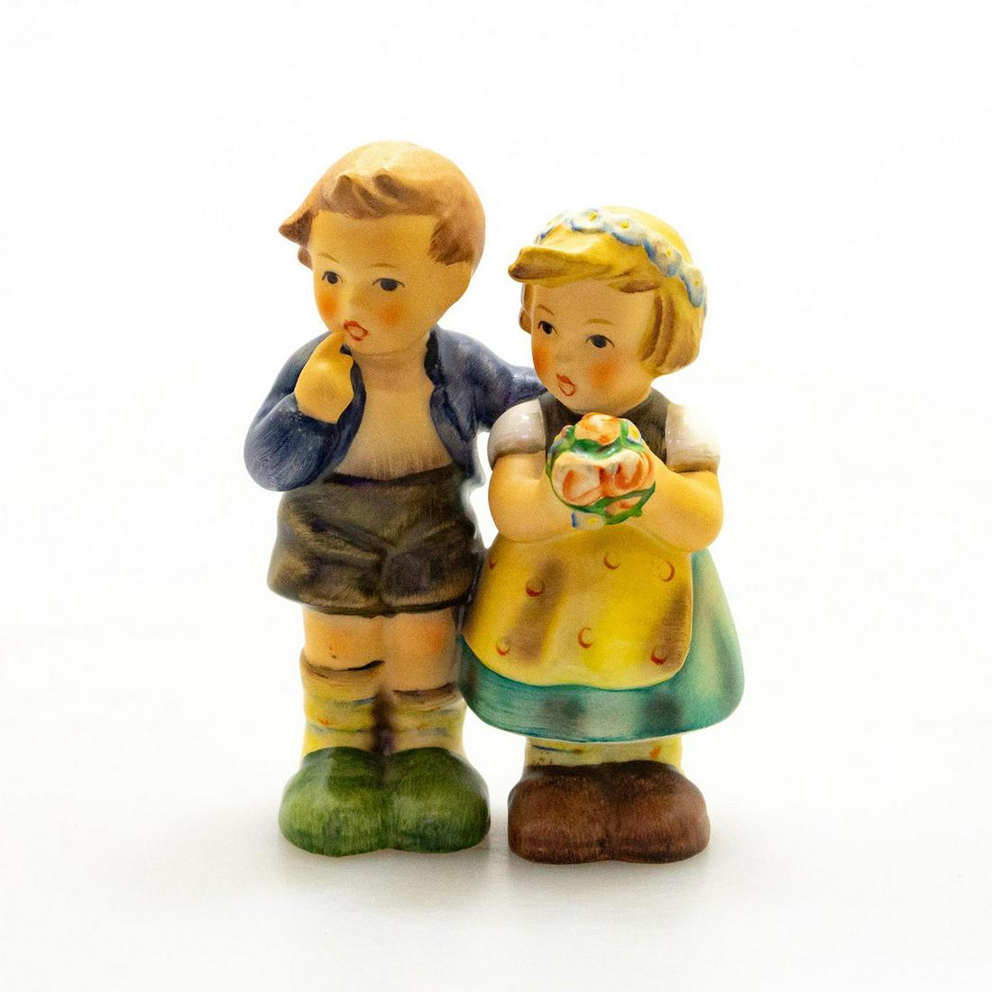 Goebel Hummel Figurine, We Congratulate: Hand painted porcelain, matte finish of a boy and girl. Impressed M.I. Hummel to back of dress. Missing Goebel factory label. Artist: M. I. Hummel Issued: 20th c. Dimensions: 3.5"H Manufacturer: Goebe
