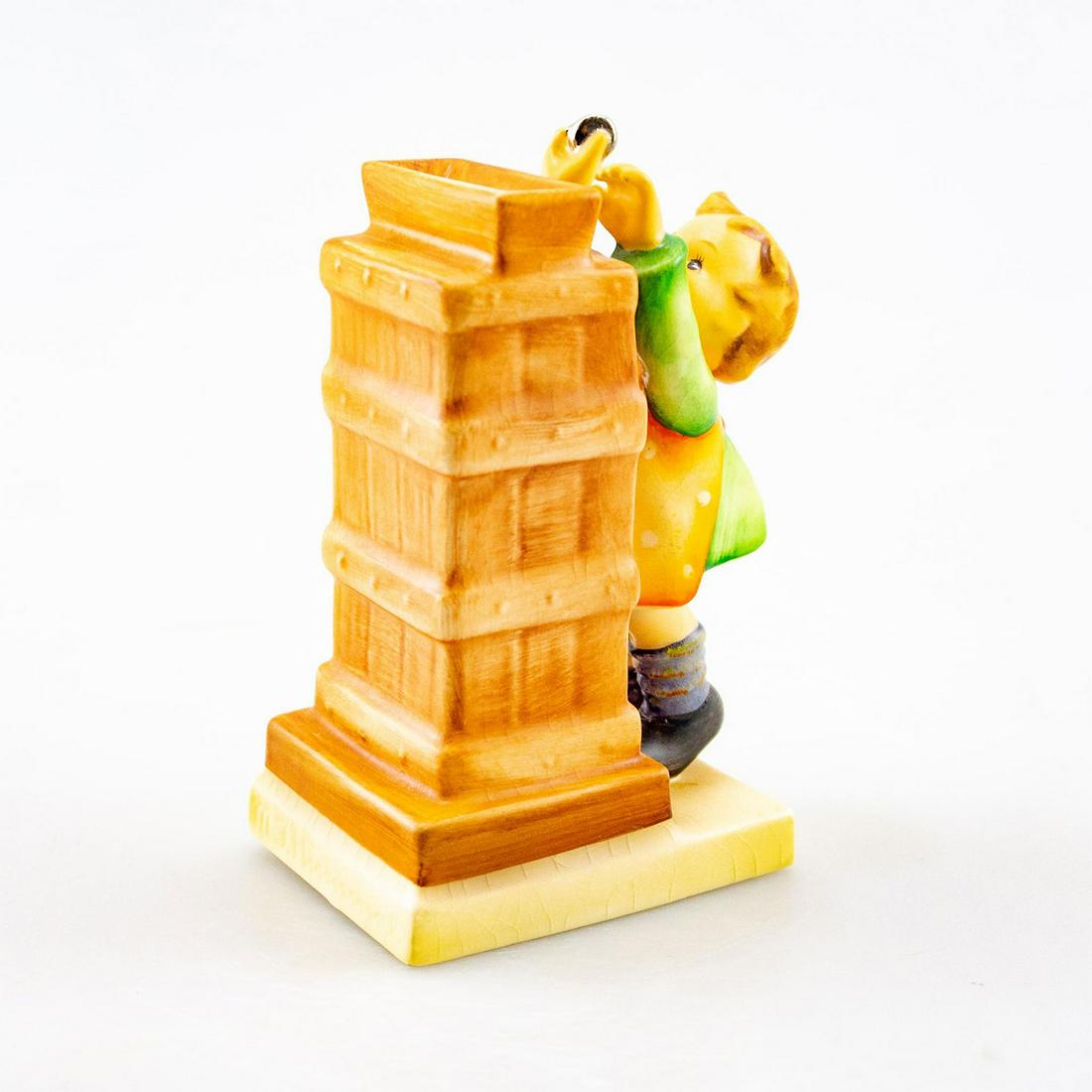 Goebel Hummel Figurine Little Thrifty Girl 118: Includes key to coin bank. Goebel backstamp. Issued: 20th C. Dimensions: 5" tall Manufacturer: Goebel Hummel Country of Origin: Germany