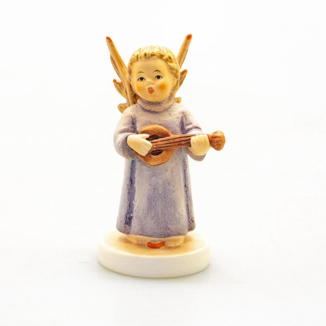 Goebel Hummel Figurine, Festival Harmony 172: Miniature angel figure. Hand crafted; hand painted. M.I. Hummel impressed on base. Goebel backstamp. Issued: 1994 Dimensions: 3"H Manufacturer: Goebel Country of Origin: Germany