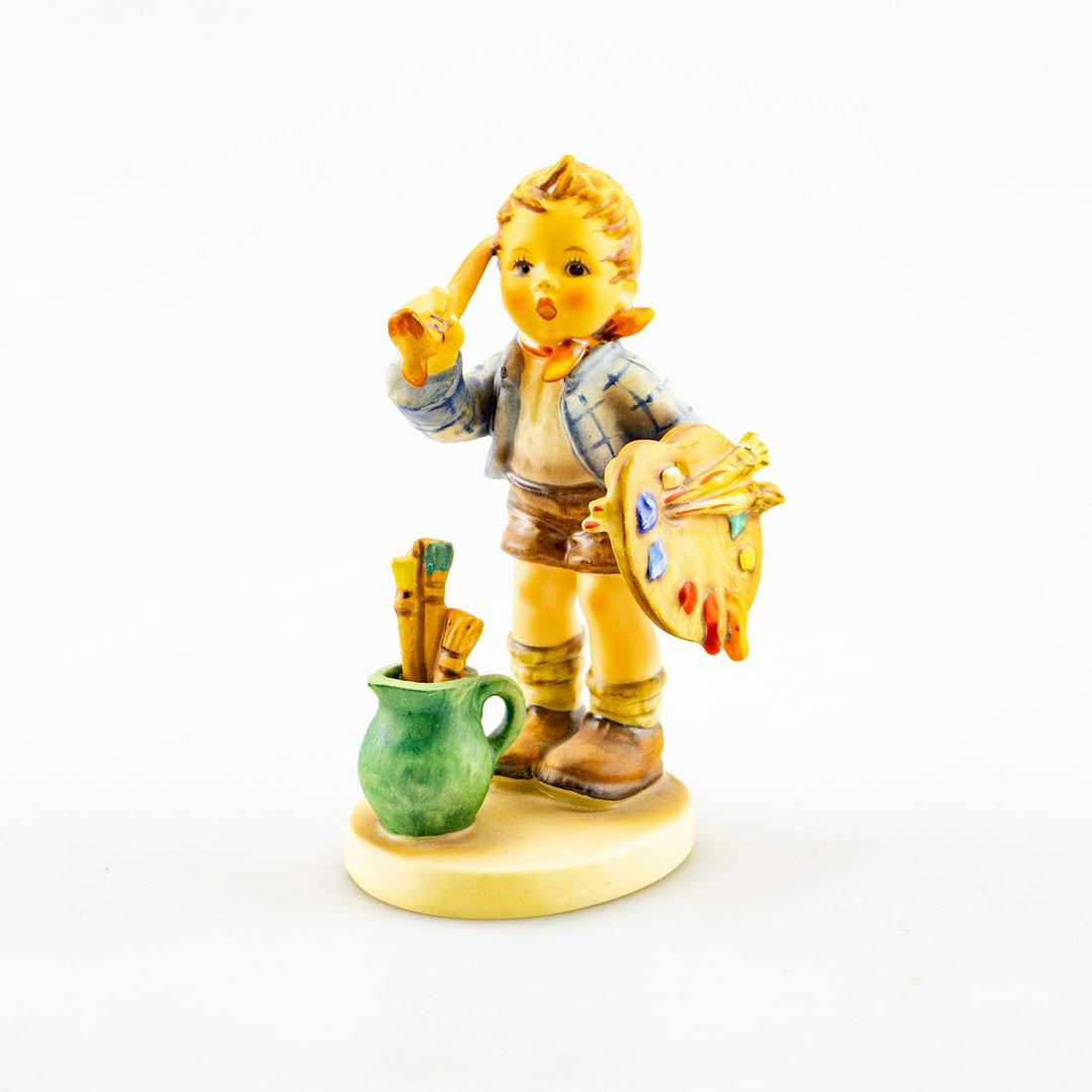 Goebel Hummel Figurine, The Artist #304: A young artist stands ready to paint with brush in right hand and palette in left hand. Issued: 1955 Dimensions: 6"H Manufacturer: Goebel Country of Origin: Germany