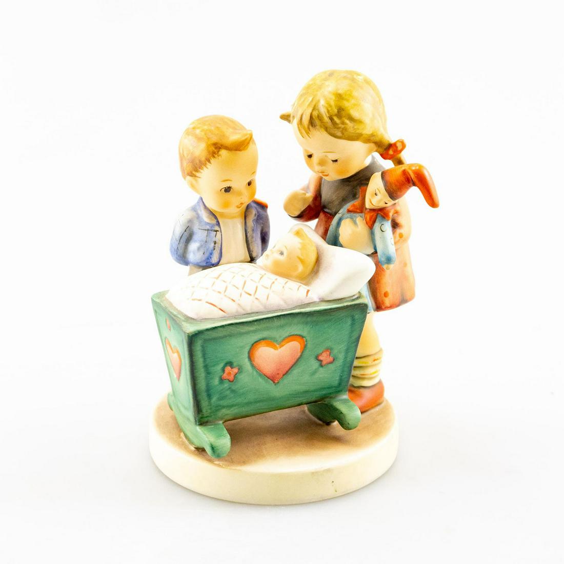 Goebel Hummel Figurine, Blessed Event 333: Young children with at new born baby. Handcrafted; hand painted. Goebel backstamp. Issued: 20th c. Dimensions: 5.5"H Manufacturer: Goebel Country of Origin: Germany