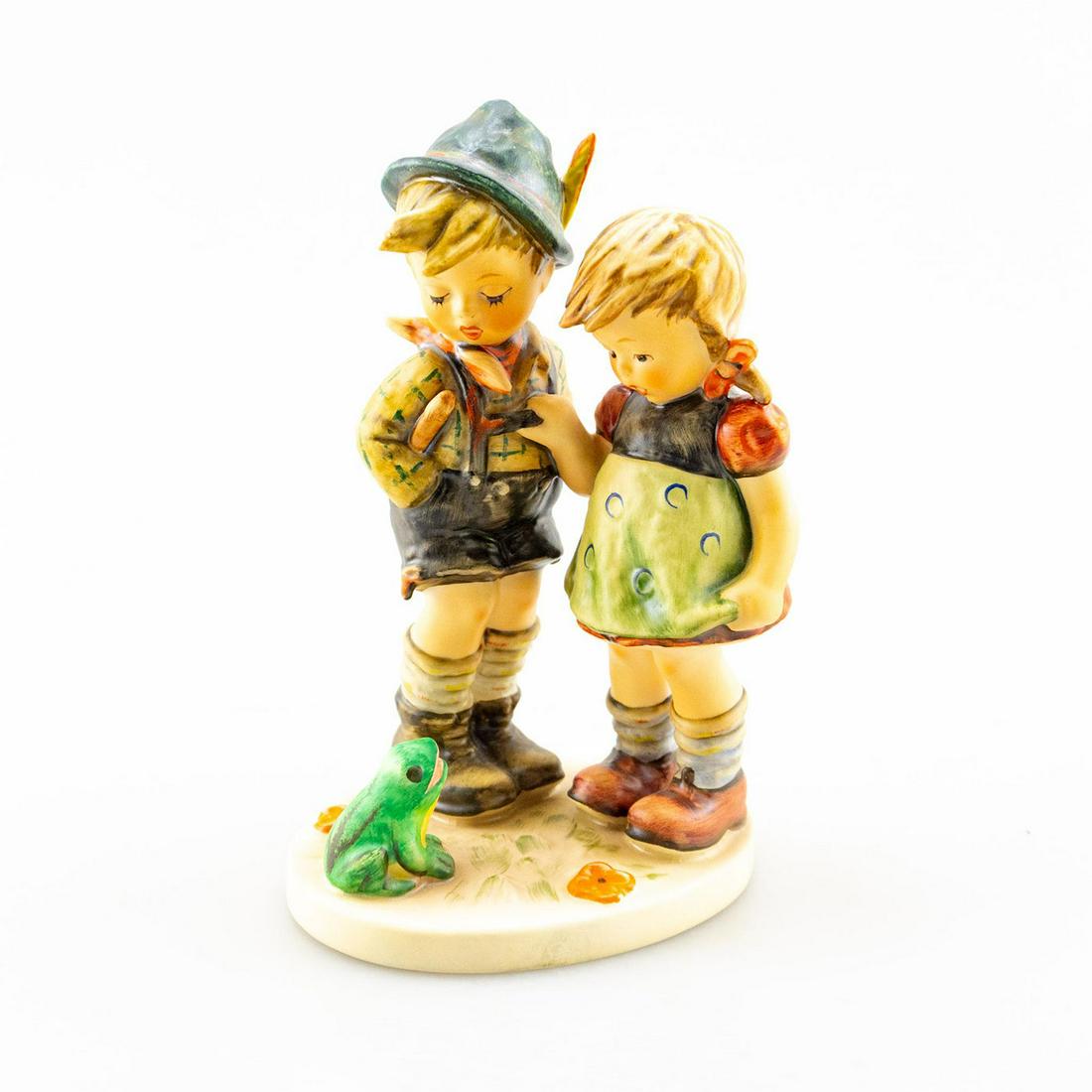 Goebel Hummel Figurine, Timid Little Sister 394: Scared young girl w. brother. Handcrafted; hand painted. Goebel backstamp. Issued: 20th c. Dimensions: 7"H Manufacturer: Goebel Country of Origin: Germany