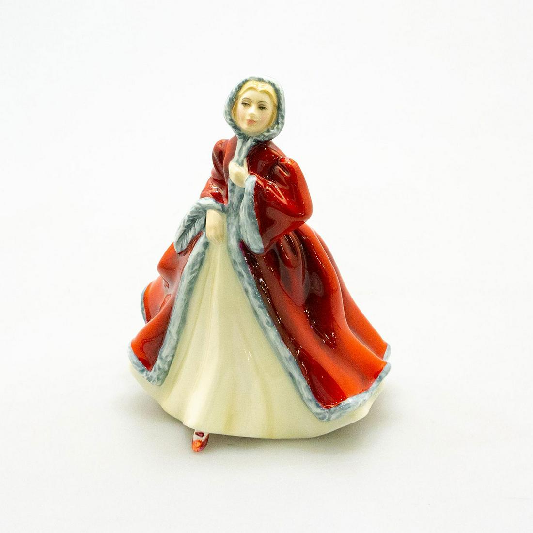 Royal Doulton Rachel Hn2936 Winter Fashion Figure: Dressed in her finest winter fashion, trimmed in white fire and dark on deep red jacket. #winterfashion #dressedtokill Artist: Peter A Gee Issued: 1985 Country of Origin: England Manufacturer: Royal D