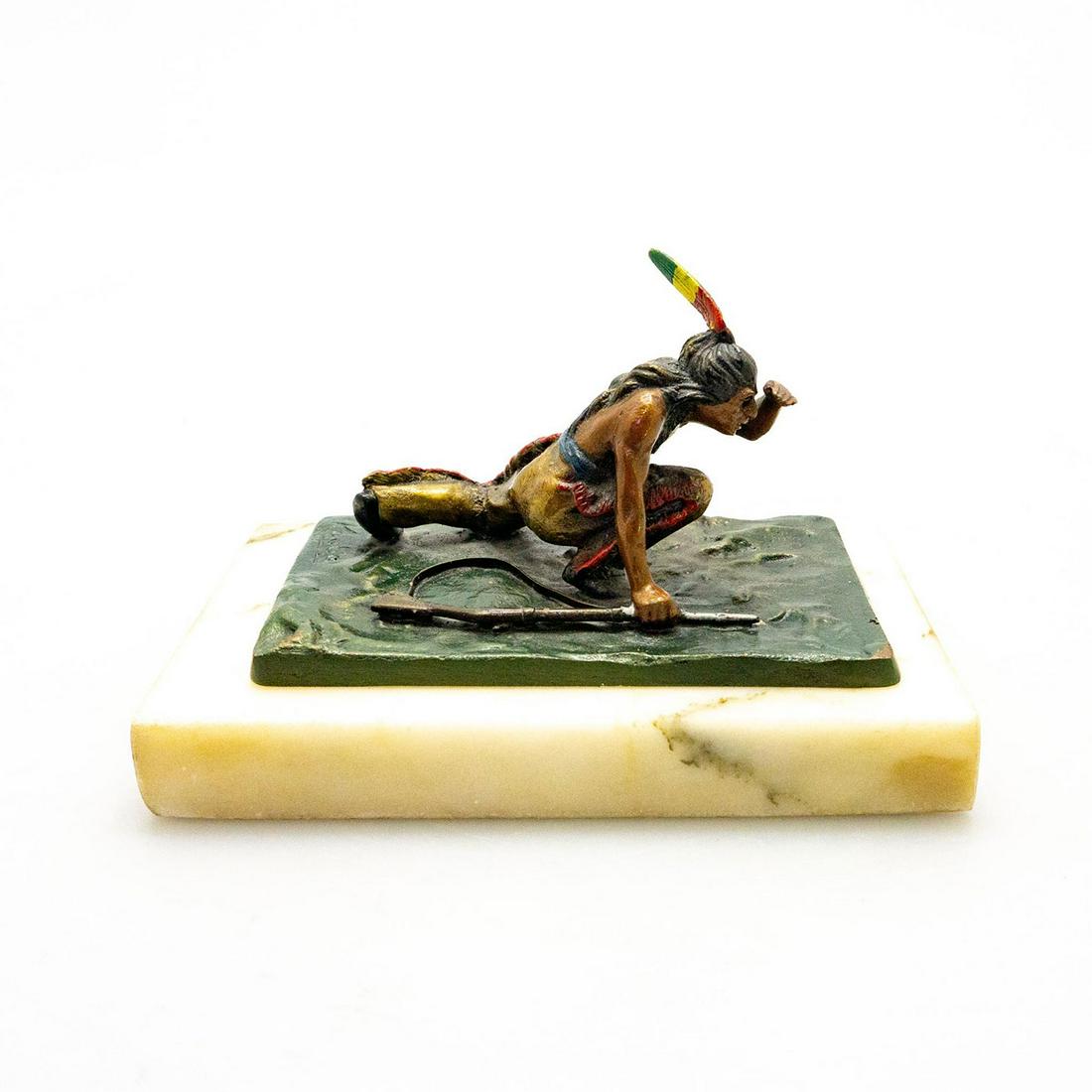 Victorian Bronze Sculpture, Native American Indian: Varicolored antique miniature study of Plains Indian warrior with rifle. Artist signed. A miniature Art Nouveau bronze sculpture by Austrian artist Carl Kauba (1865-1922), modeled after a Plains India