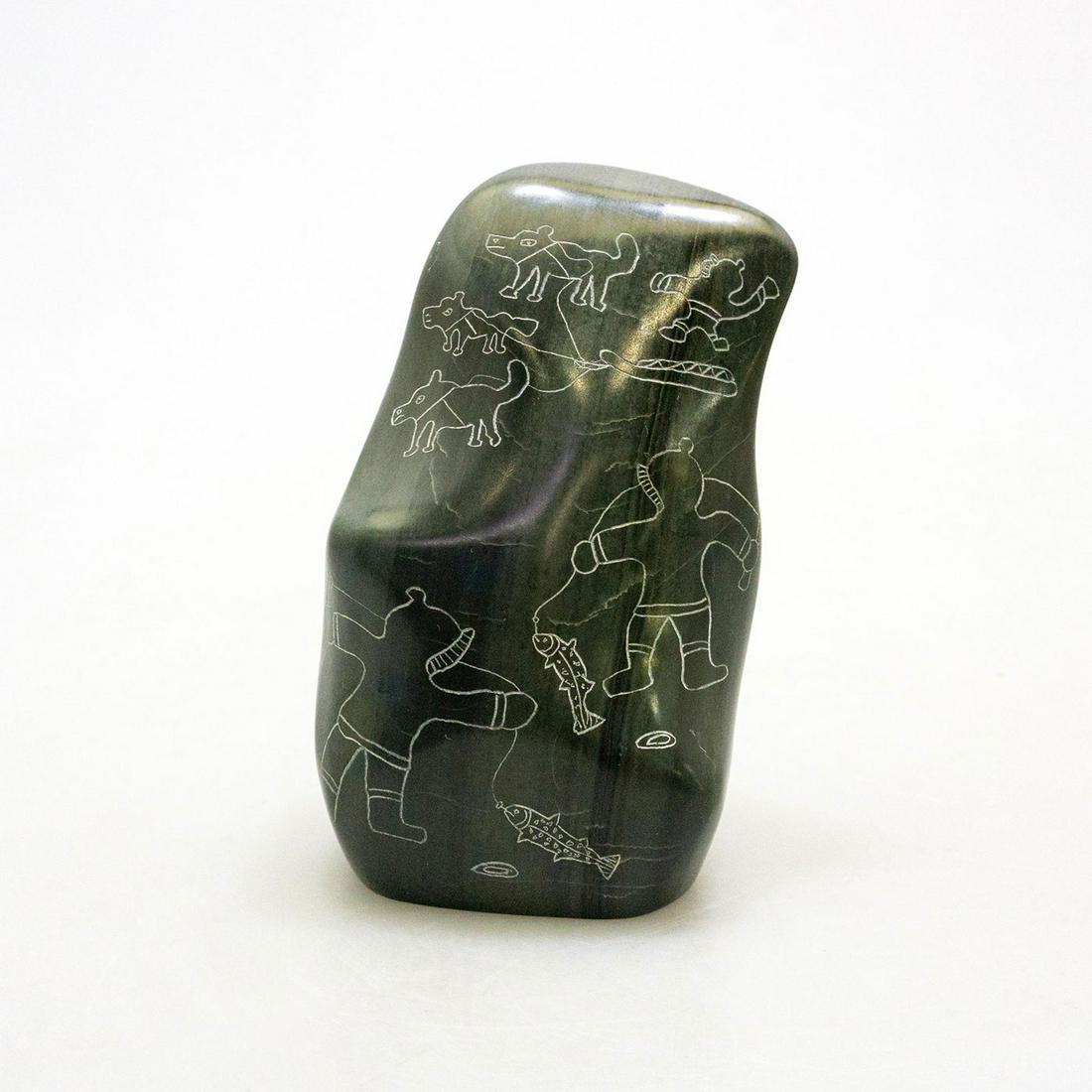 Inuit Tribal Soapstone/Regional Stone Sculpture,: Dark green carving with incised images of Native Inuits hunting, fishing. Artist signed. This striking polished dark green soapstone was hand carved by Inuit artist George Arlook (Arluk) George Arluk,
