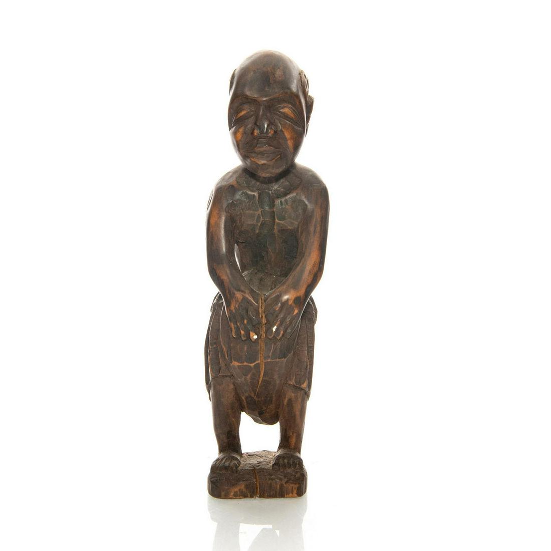 African Wooden Sculpture Of Tribal Drum Player: Hand carved figure with drum between legs. Issued: 20th c. Dimensions: 11"H Provenance: David Farin Collection