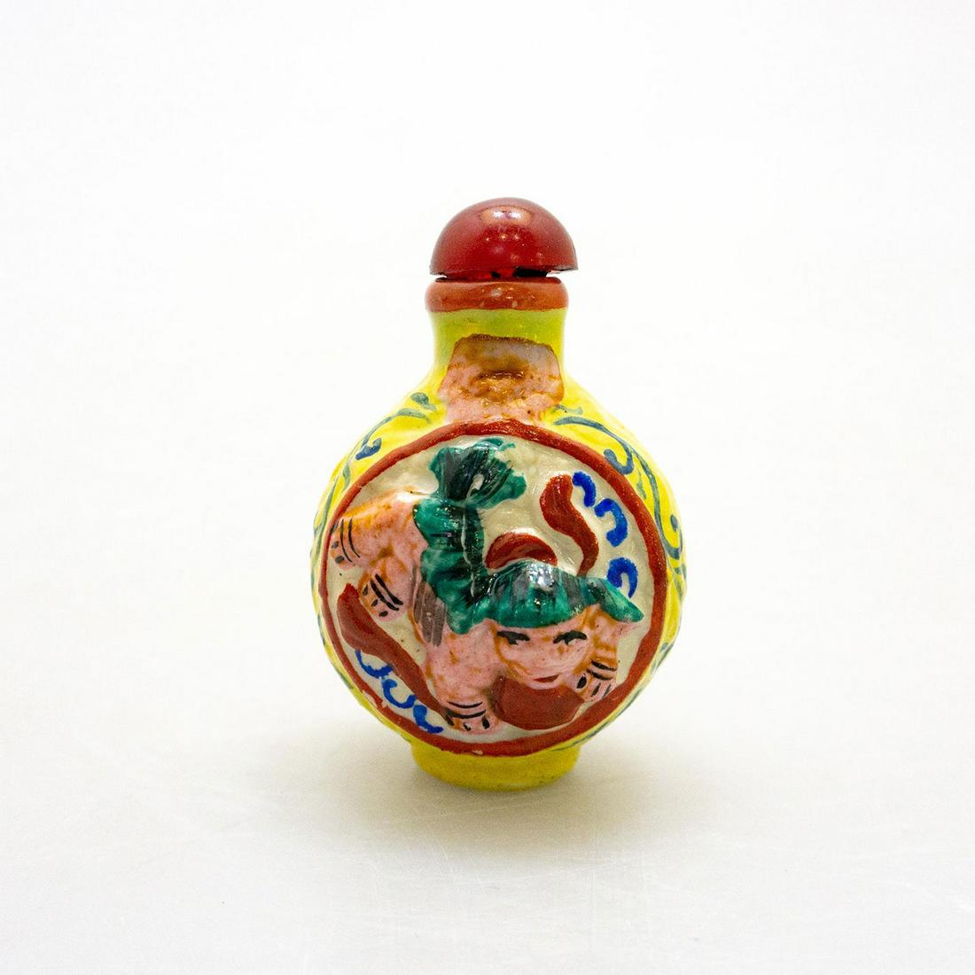 Chinese Vintage Snuff Bottle, Foo Guardian Lions: Decorated in relief, lustrous canary yellow with opposing pink Foo Dogs. #VintageSnuffBottles #SnuffBottles #ChineseGuardianLions #FooDogs #Tobacciana Issued: c. 1970 Dimensions: 2.5"H x 1.75"W Countr