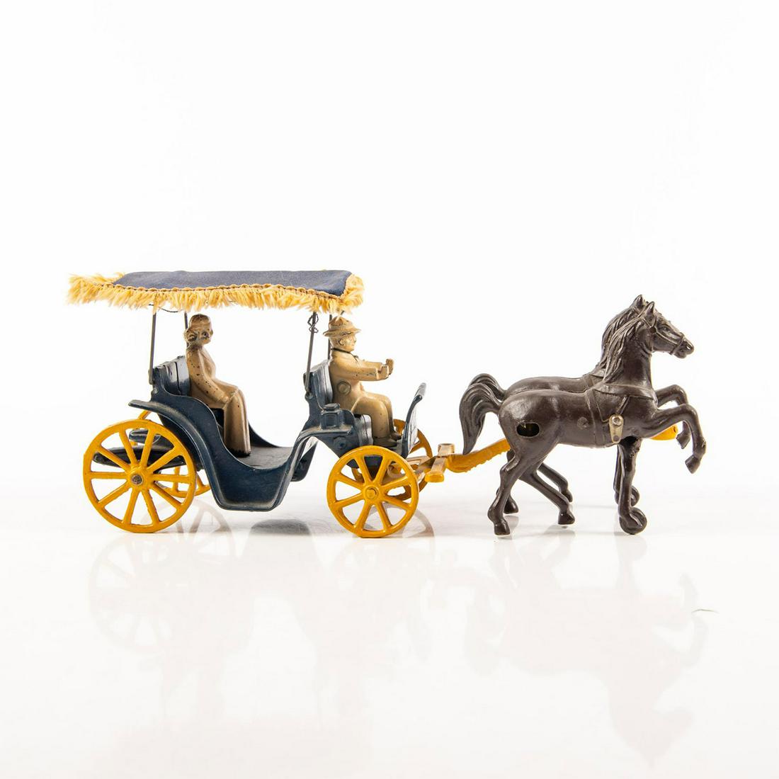 Vintage 1940 Stanley Toys Cast Metal Horse Carriage: Missing chains that attaches from the horses to the carriage. Embossed Stanley Toys Made in USA to underside. Age related wear. Issued: 1940 Dimensions: 4.75"H x 11.5"L Manufacturer: Stanley Toys Coun