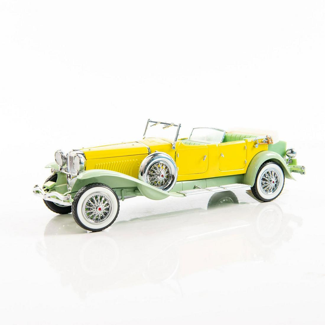 Franklin Mint Precison Model Car: Depicts a 1930 Duesenberg J Derham Tourster. Die-cast model. Car top detached. Issued: c. 1987 Dimensions: 2.75"H x 9.75"L Manufacturer: Franklin Mint Precision Country of Origin: USA