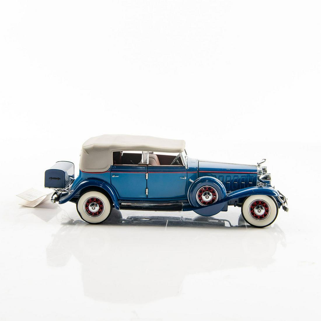 Franklin Mint Precison Model Car: Depicts a 1932 Cadillac V-16. Die-cast model. Issued: 20th c. Dimensions: 2.75"H x 9.75"L Manufacturer: Franklin Mint Precision Country of Origin: USA