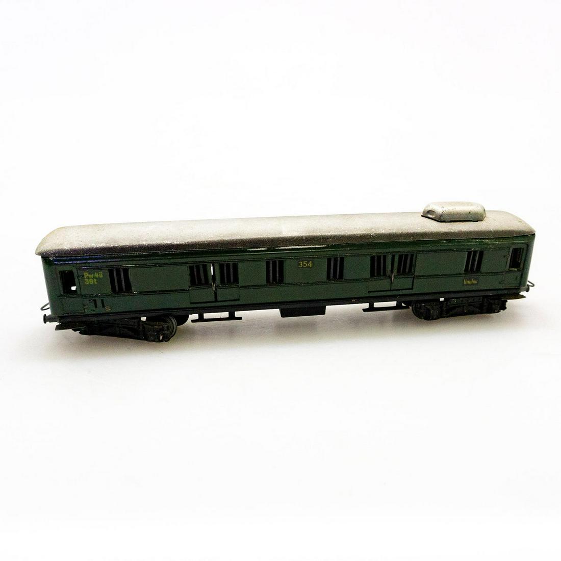 Marklin Ho Scale Model Train Car, Luggage Carrier #354: Issued: 20th c. Dimensions: 2.25"H x 9.75"L Manufacturer: Marklin Country of Origin: Germany