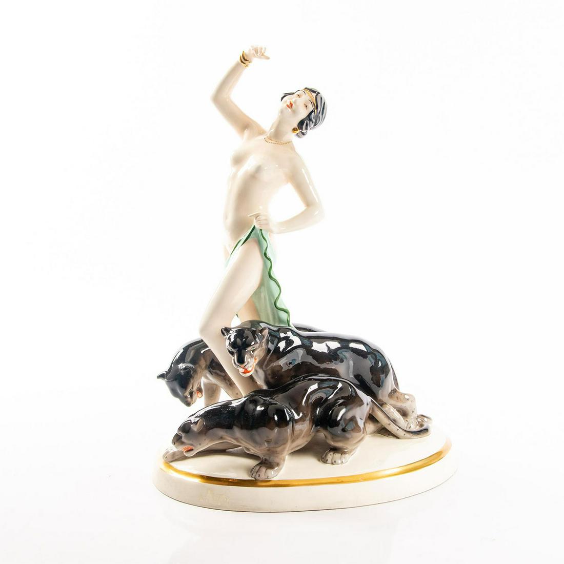 Royal Dux Lady Dancing With Panthers Figurine: This is very rare and outstanding figurine. Depicts a gorgeous semi-nude lady who is dancing with a group of 3 panthers. Marked on the bottom of the base. Professional restoration to thumb of right ha