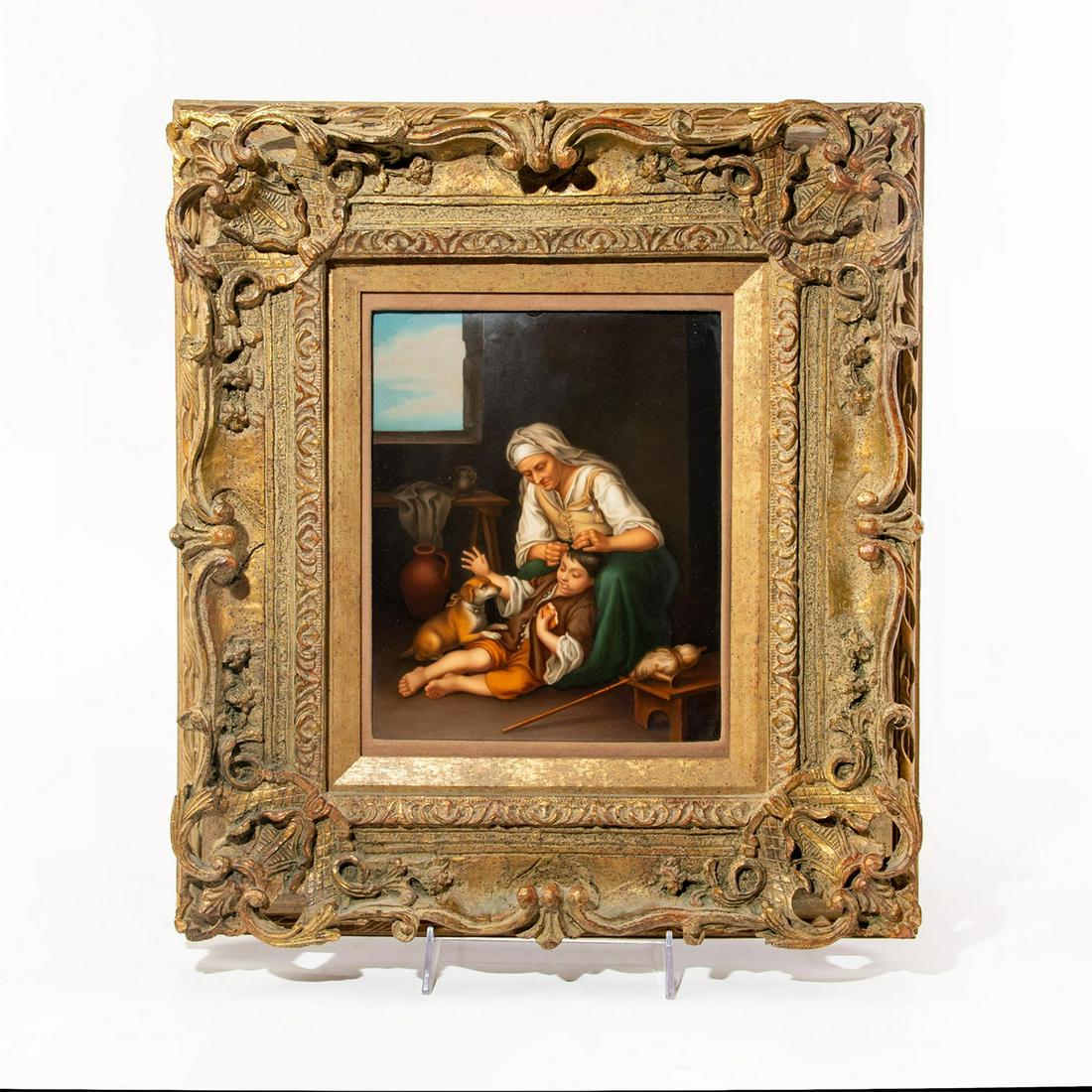 Framed Kpm Porcelain Plaque, Woman, Child And Dog: Scene showing a woman tending to the hair of a small boy who has a small dog resting up on his leg. Housed in a carved, decorated gilt frame. Back impress marked KPM with scepter and incised 12A and a