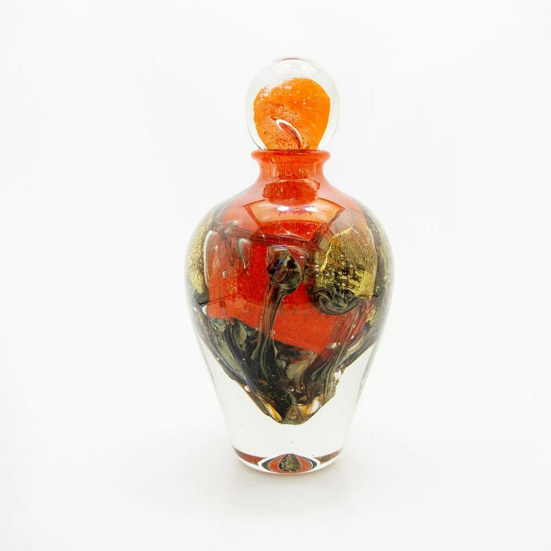 Jean-Claude Novaro Lg Red Glass Bottle Art With Dauber: Falcon Red Paysages, blown-glass with golden blown formations along the body. Finished with spherical dauber. Signed and dated to bottom base. Artist: Jean-Claude Novaro Issued: 2005 Dimensions: 9.5"H