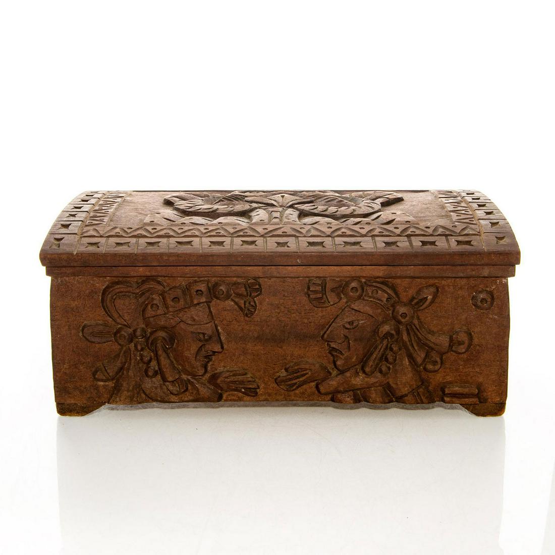 Central Or South American Carved Wood Box: Hand carved, w. geometric, animal, figural designs. Figural carvings depict indigenous South American peoples. Possibly Incan, Mayan, or Aztec. Issued: 20th c. Dimensions: 12.25"L x 7.75"D x 5.25"H Pr