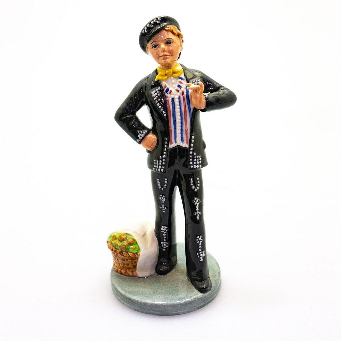 Pearly Boy HN2767 - Royal Doulton Figurine: Royal Doulton backstamp. English (UK) Heritage Artist: William K. Harper Issued: 1988 - 1992 Dimensions: 7.5"H Manufacturer: Royal Doulton