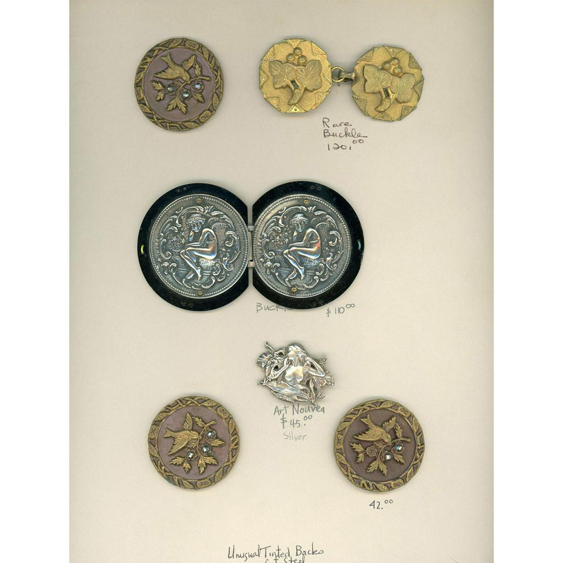 1 Whole Card Of Assorted Metal Buckles Incl. Silver: 3 Large buckles and 3 large buttons all in metal. Included is a two piece brass handkerchief corner buckle, a lovely pierced sterling silver 1 piece buckle, a 2 piece celluloid and white metal buckle 