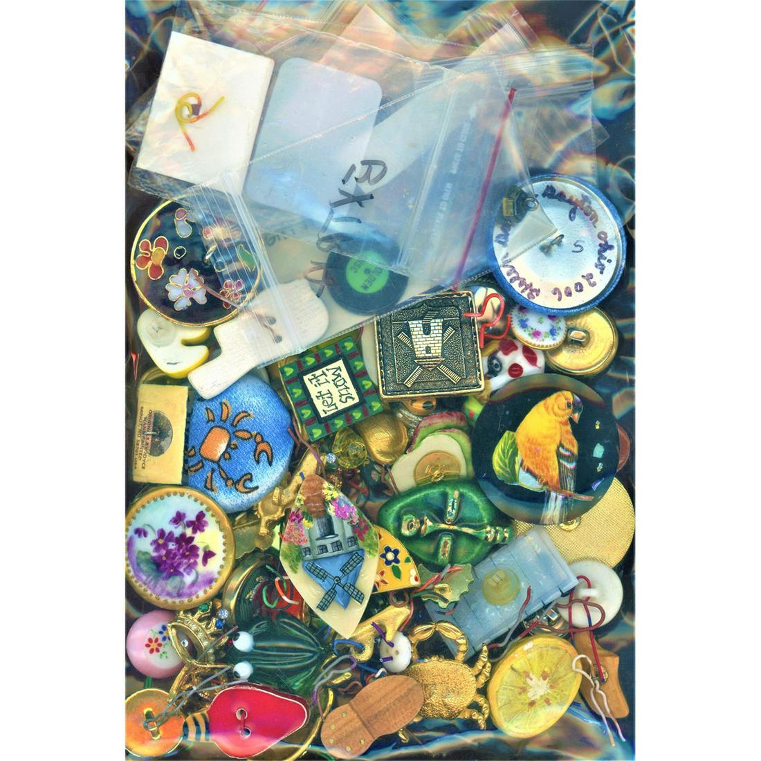 A Large Bag Lot Of Colorful Assorted Material Buttons: A really fabulous large bag lot of assorted material buttons. This is a great bag lot full of ceramics, plastics, metals, fabric, enamels, glass, wood, studio buttons, wow this bag is full of surprise