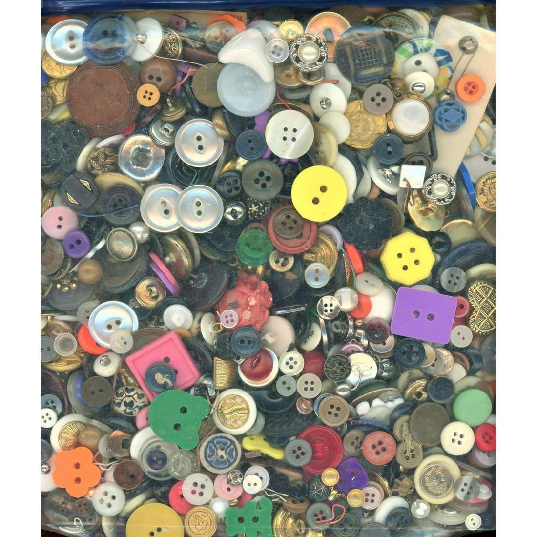A Big And Heavy Bag Of Assorted Buttons: The heaviest bag yet of colorful buttons. Included are plastics, pearl, metal and so much more. Good lot to create with. Issued: DIVISION 1=PRE 1918 AND DIVISION 3 IS AFTER 1918 Dimensions: SM=Less th