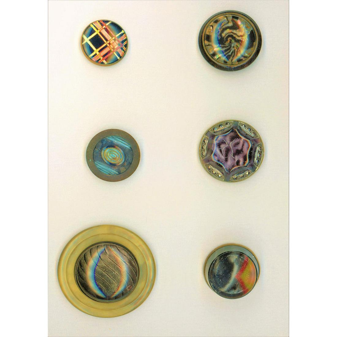 A Small Card Of Design Under Glass Buttons: 10 Medium and Large 18th and 19th design under glass buttons. The lot includes 4 medium late 18th early 19th century gilded metal mounted tin backed under glass buttons, 1 extra large 19th century und