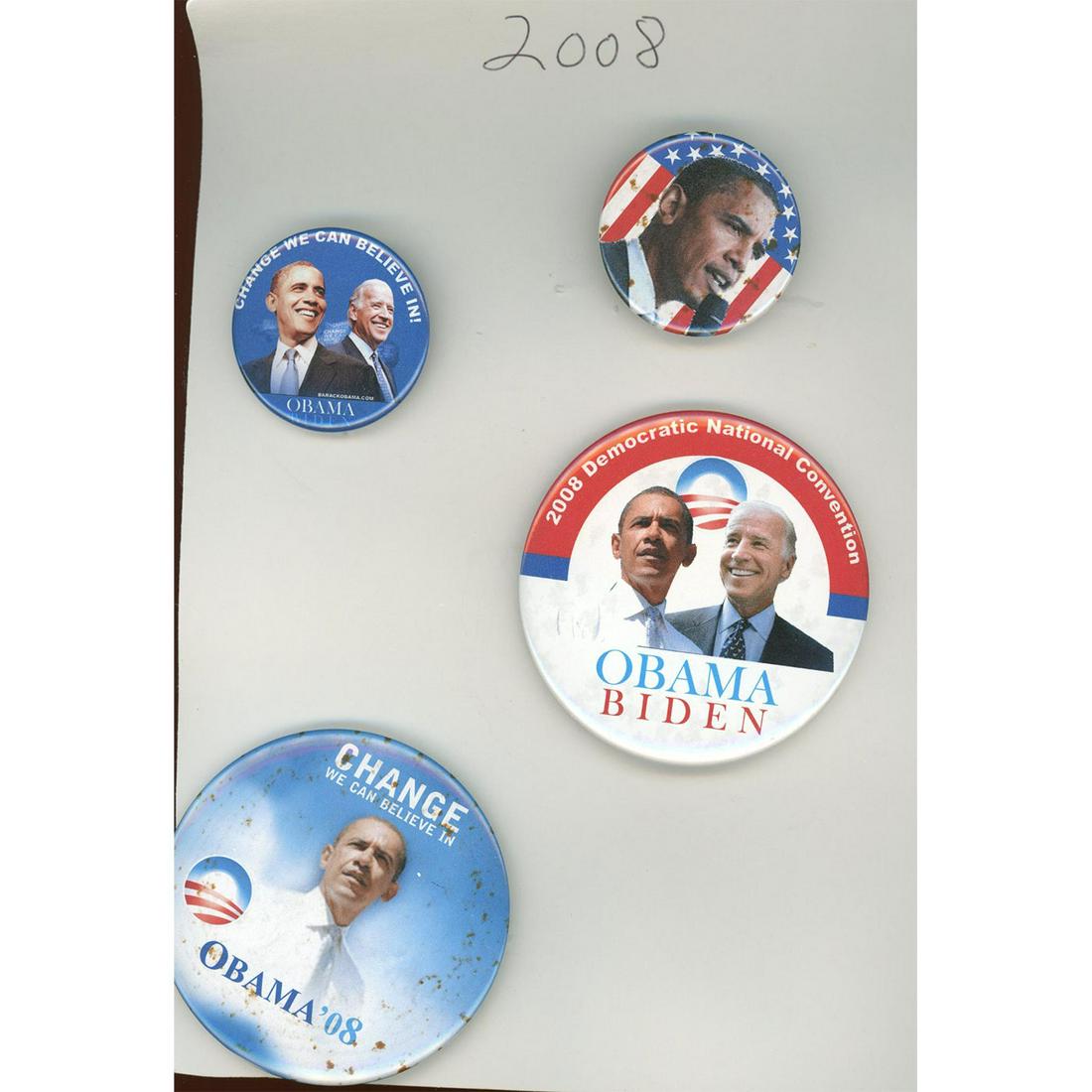 An Assortment Of Campaing Political Pin Back Buttons: A collection of late 20th and 21st Century political buttons. This lot includes campaign political pinback buttons for Bill Clinton and Barrack Obama. Issued: DIVISION 1=PRE 1918 AND DIVISION 3 IS AFT