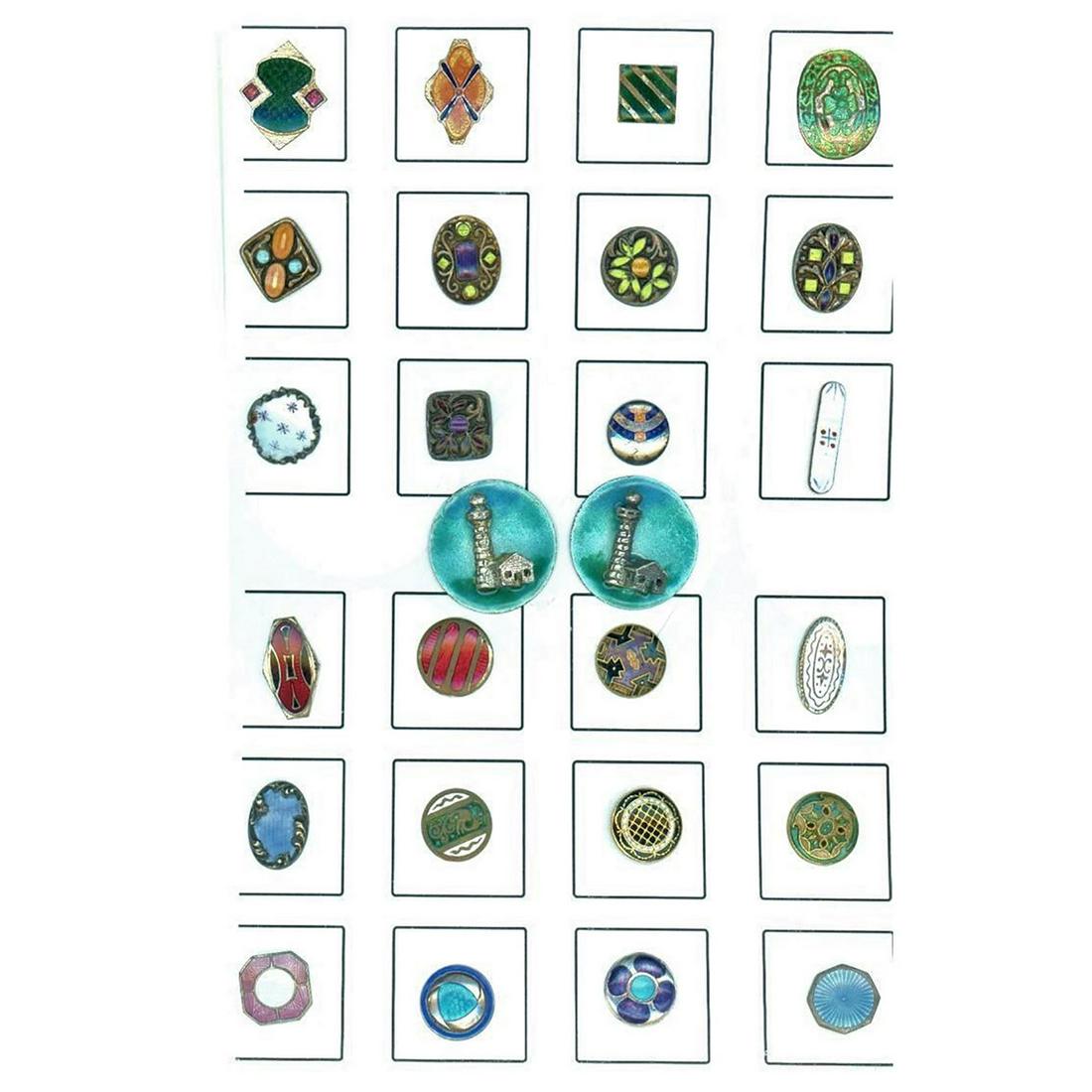 A Card Of Assorted Enamel Buttons: 26 Small/Medium enamel buttons in assorted techniques. This lot includes Champleve, Polychrome, Guilloche and Arts and Crafts including two medium silver Lighthouses. Issued: DIVISION 1=PRE 1918 AND D