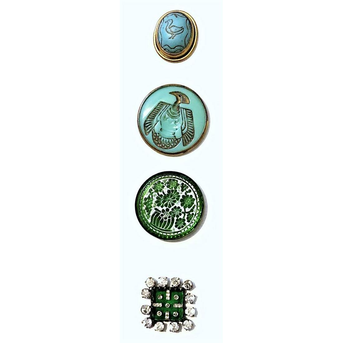 A Small Card Of Glass Set In Metal Buttons: 4 Medium size pictorial and non pictorial glass in metal buttons. Included in this lot is a wonderful square green glass precision inlay with paste border, a low relief molded glass & white paint DF b