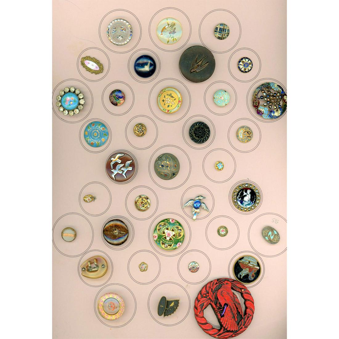 A Card Of Assorted Material Buttons Including Glass: 35 Small/Medium/Large assorted material buttons. This lot includes glass, Burwood, horn and several enamels including a beautiful floral bouquet on blue ground with paste border, a medium En Grisaille