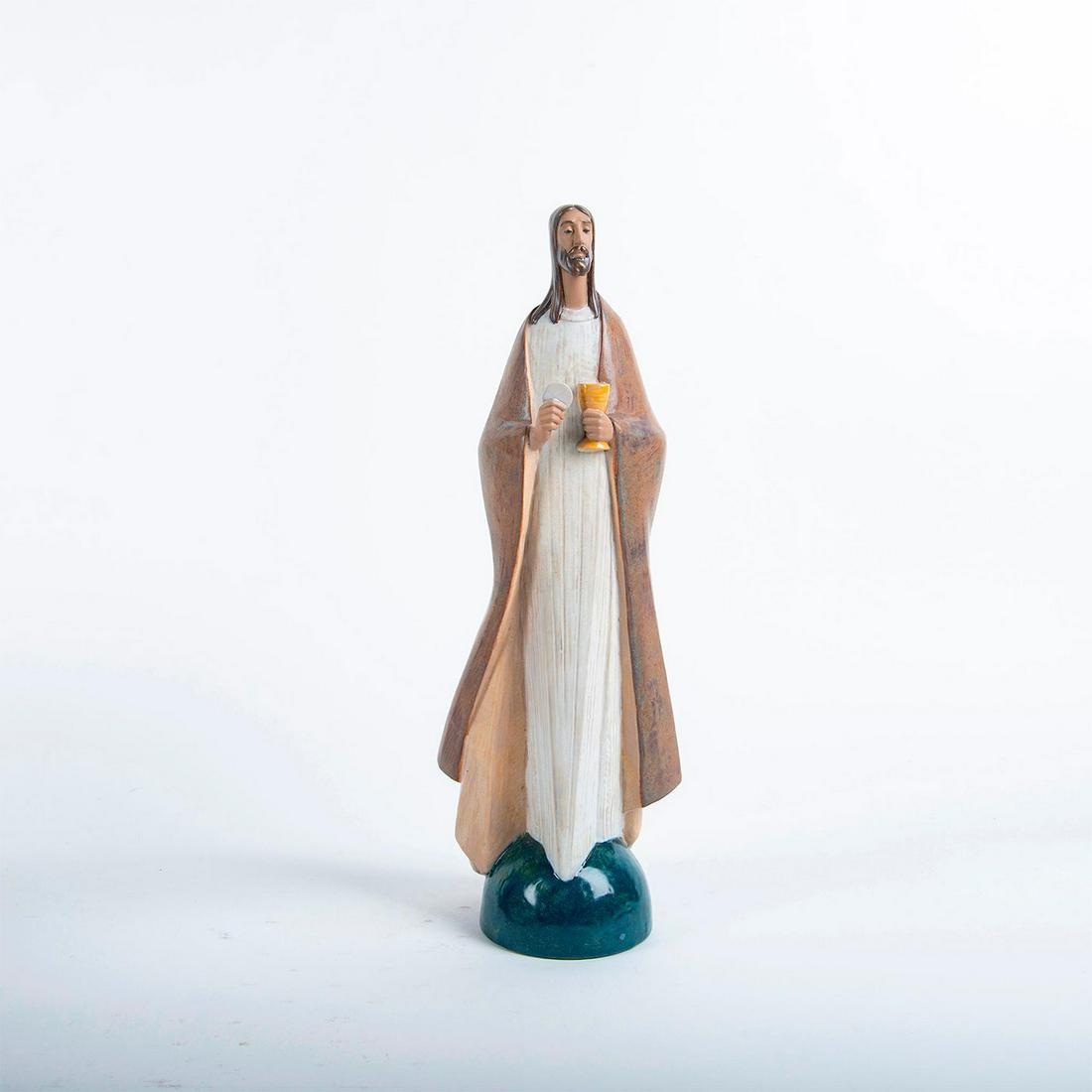 Lladro Figurine, Bread Of Life 01002366: Gres finish; modeled as Jesus with the bread of life. Lladro backstamp. Includes original box. Artist: Jose Puche Issued: 1997 Dimensions: 16.5"H Manufacturer: Lladro Country of Origin: Spain Conditio