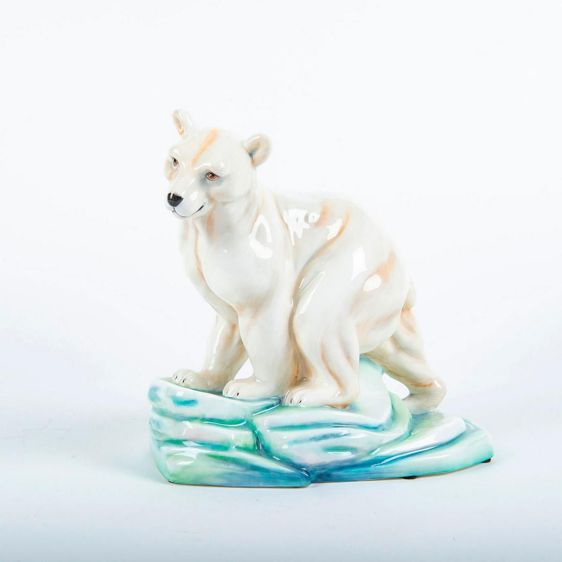 Royal Doulton Animal Figure Group, Polar Bear And Cub: Noke Tribute Collection; limited edition. Hand made; hand decoration. Standing polar bears. Royal Doulton marks on the underside. Issued: 2001 Dimensions: 9.5"L x 9.75"H Edition Number: 80 of 200 Manu
