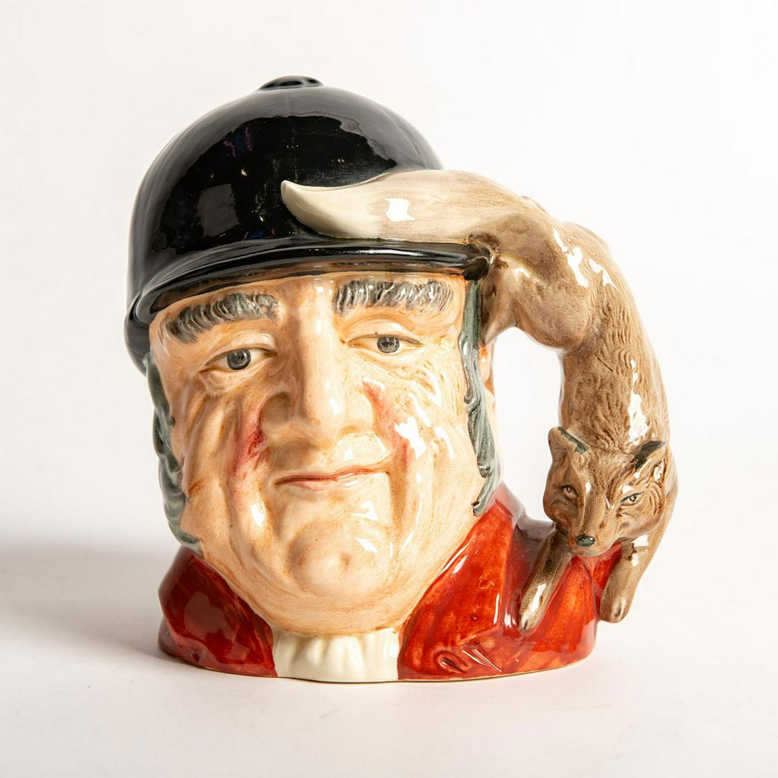 Gone Away D6531 - Large - Royal Doulton Character Jug: Modeled as a British huntsman with a fox handle. Royal Doulton backstamp. Artist: Garry Sharp Issued: 1960 - 1982 Dimensions: 7.25"H Manufacturer: Royal Doulton Country of Origin: England