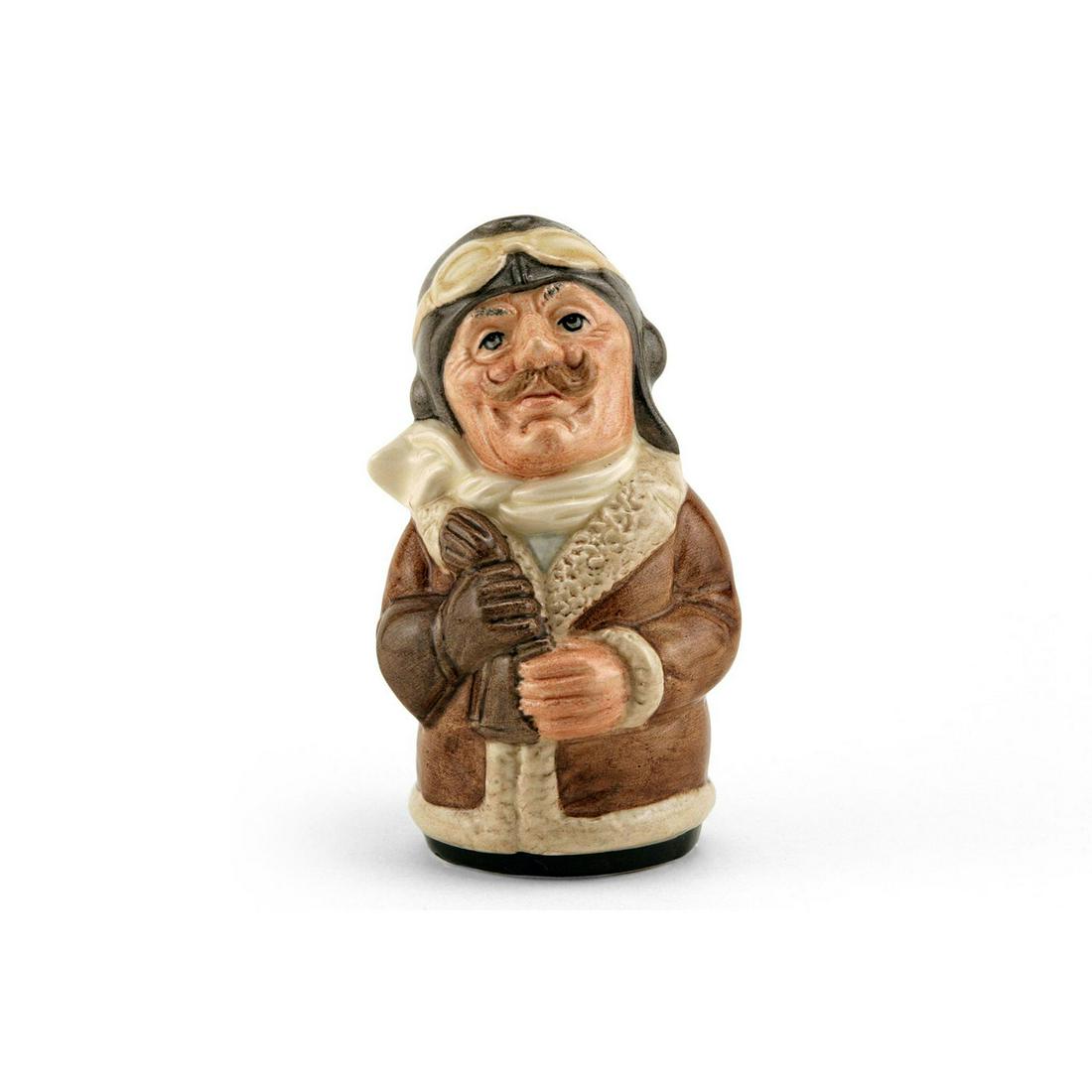 Captain Prop The Pilot D6812 - Royal Doulton Toby Jug: Royal Doulton Toby Jug, Captain Prop the Pilot D6812 (brown coat and gloves; grey cap; cream scarf). Designed by William K. Harper. Series: The Doultonville Collection, issued 1989 - 1991. Size: 4''H